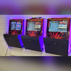 Row of three wall-mounted arcade machines