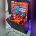 MadeForArcade wall-mounted arcade machine with joysticks and screen