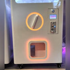 Close-up of the coin slot and capsule outlet on the XXL capsule tower