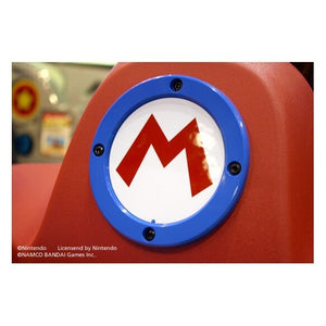 Mario Kart Arcade GP DX seat with Mario logo close up
