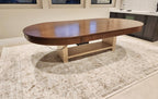 Oval poker table with optional oak dining top fitted, used as a dining table