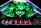 Predator Pinball Machine by Pinball Brothers - illuminated Yautja apron display
