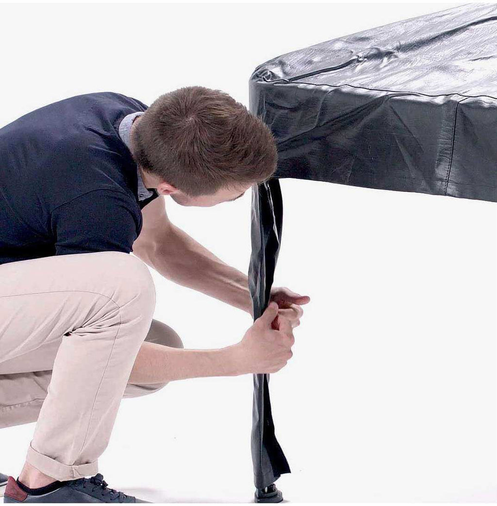 PVC protective cover fitted over the Cornilleau Hyphen Outdoor 7ft pool table, close view