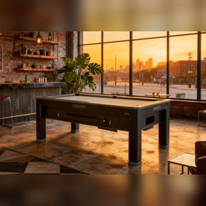 Rasson Ironman 7ft English pool table in a loft-style room at sunset