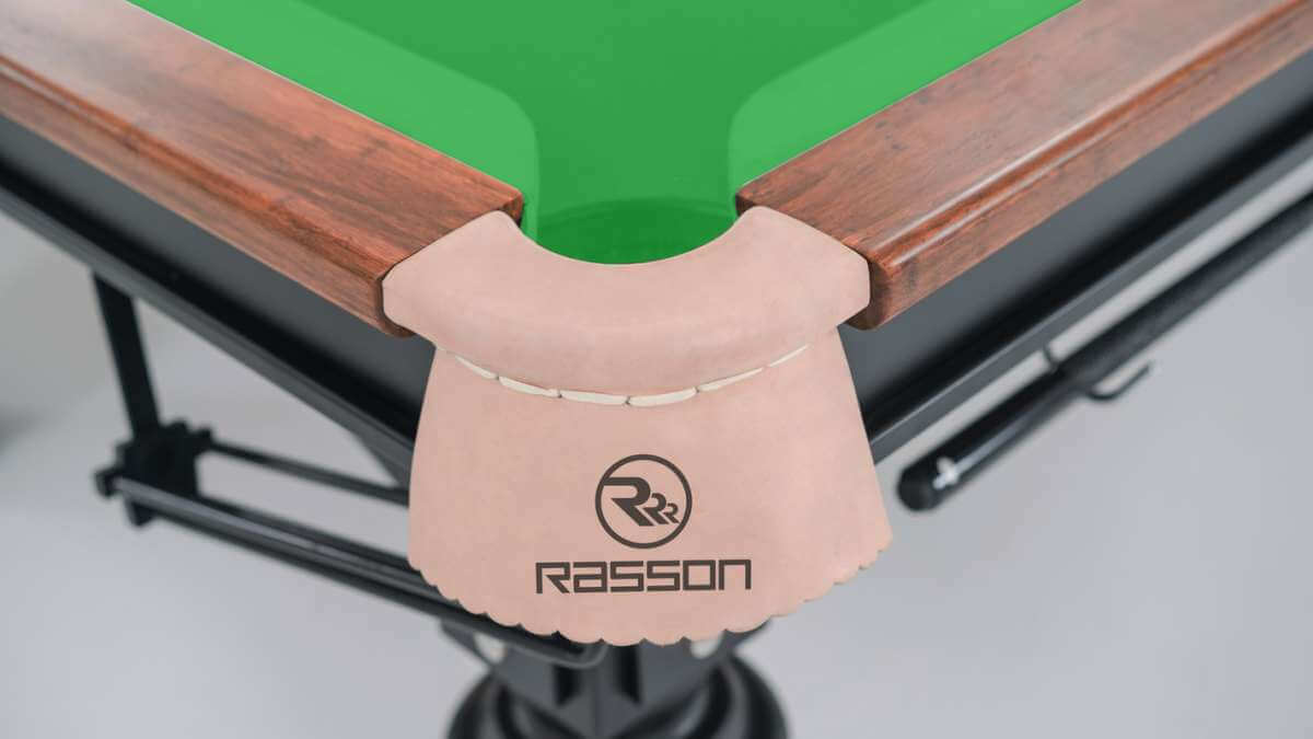 Close-up of the corner pocket plate and cushion on the Rasson Strong II 12ft snooker table