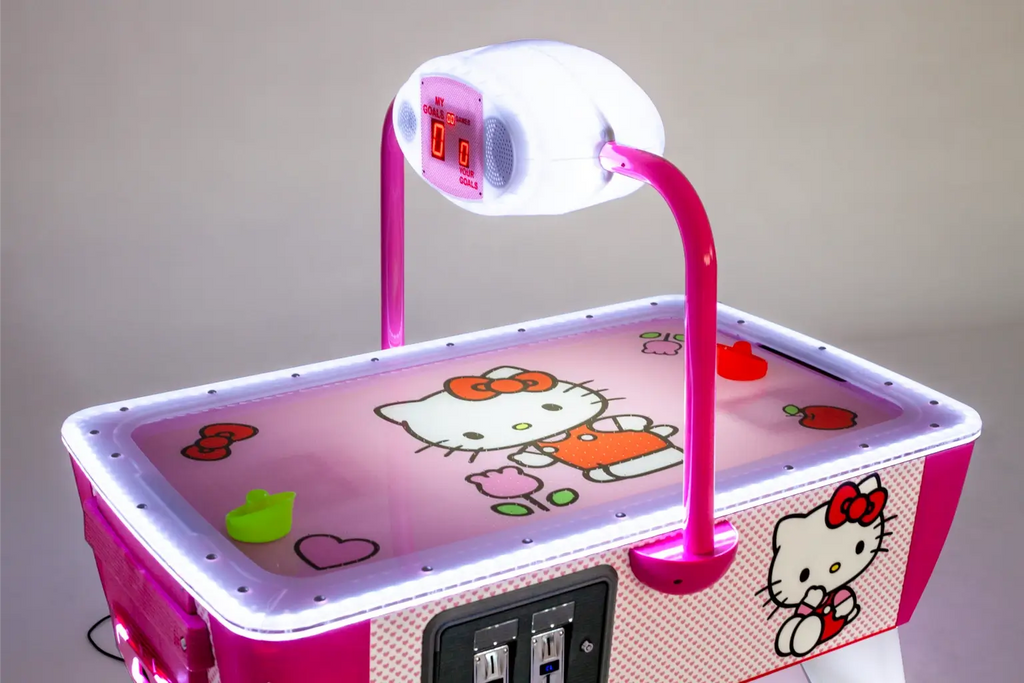 Hello Kitty printed playfield and overhead scorer on the SAM Baby Evo