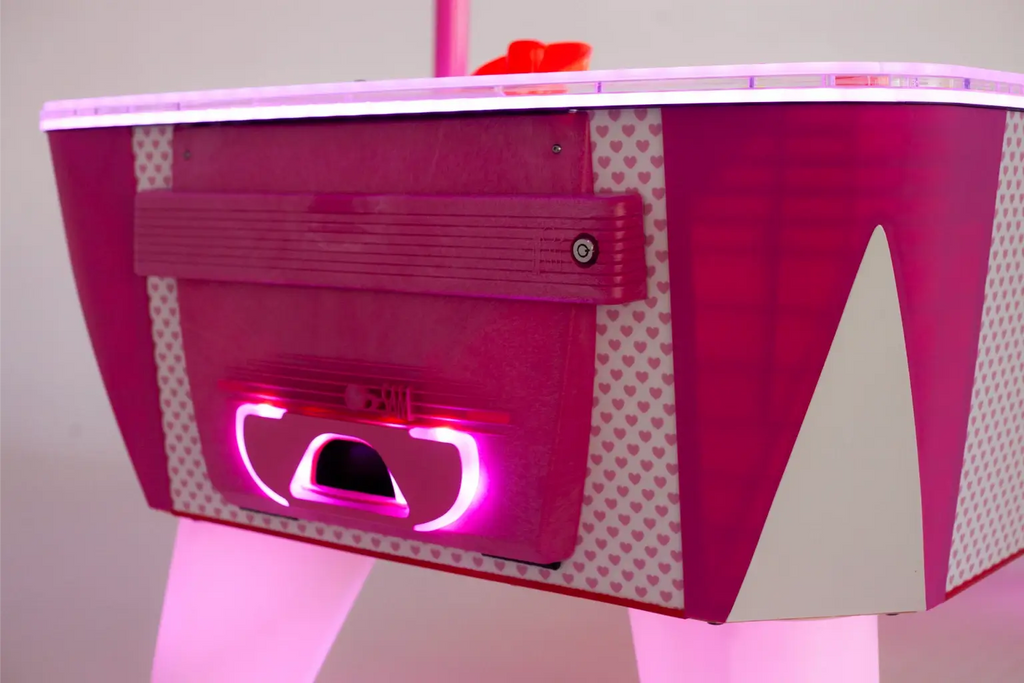 Close-up of the illuminated puck exit on the Hello Kitty Baby Evo