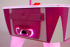 Close-up of the illuminated puck exit on the Hello Kitty Baby Evo