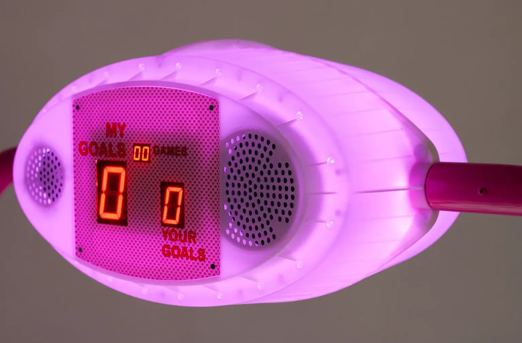 Close-up of the pink illuminated overhead scorer on the Hello Kitty Baby Evo