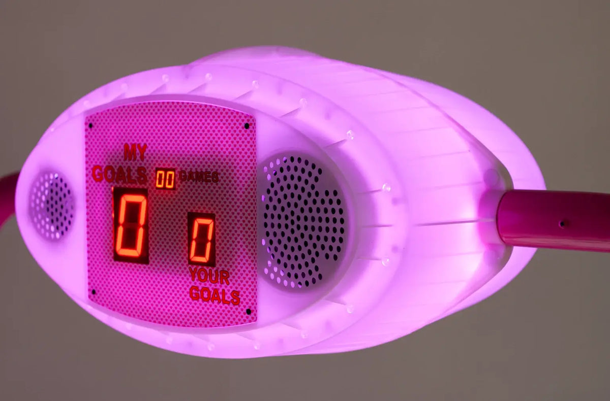Close-up of the pink illuminated overhead scorer on the Hello Kitty Baby Evo