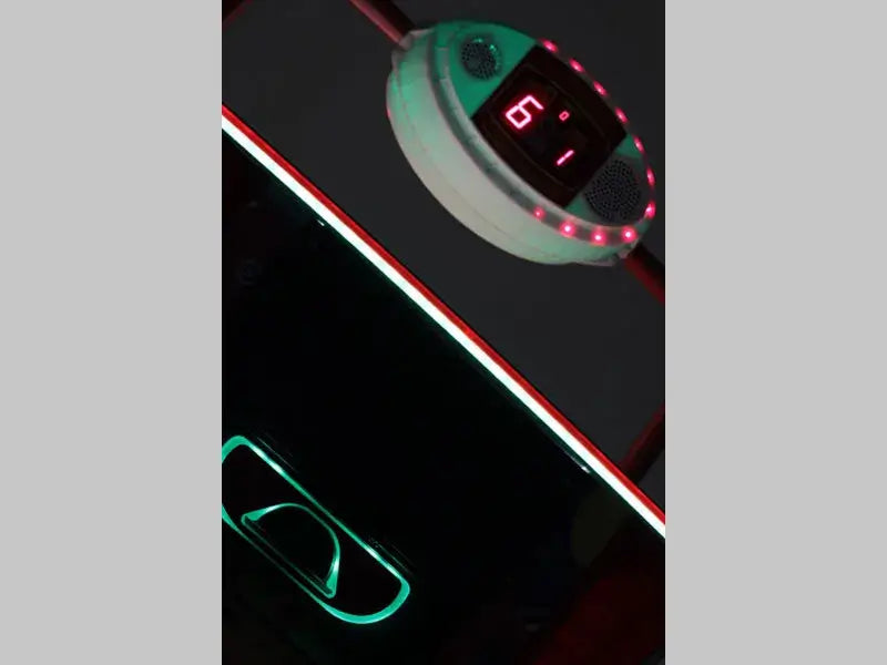 Close-up of the SAM Baby Evo illuminated top rail and goal