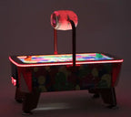 SAM Baby Evo air hockey table glowing with red LED lighting