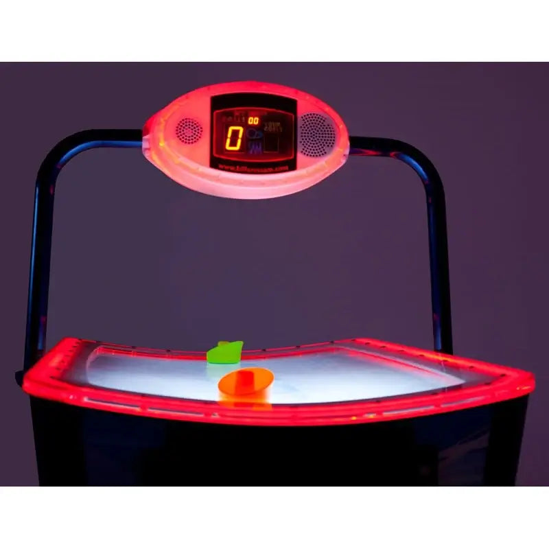 SAM Baby Slalom Evo playfield and puck under red lighting