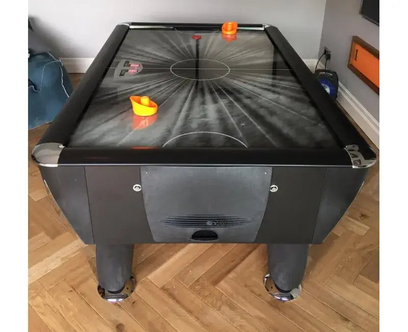 End view of the SAM Black Ice II showing the puck exit and bats