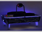 SAM Double Evo air hockey table glowing with blue LED lighting