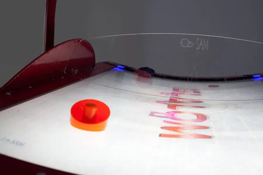 Puck on the SAM Slalom Evo II curved playfield