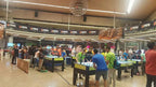 Rows of SAM Tecno Professional football tables at a tournament