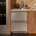 Signature Kitchen Suite stainless steel fridge drawers built under a marble bar counter beside a wine fridge