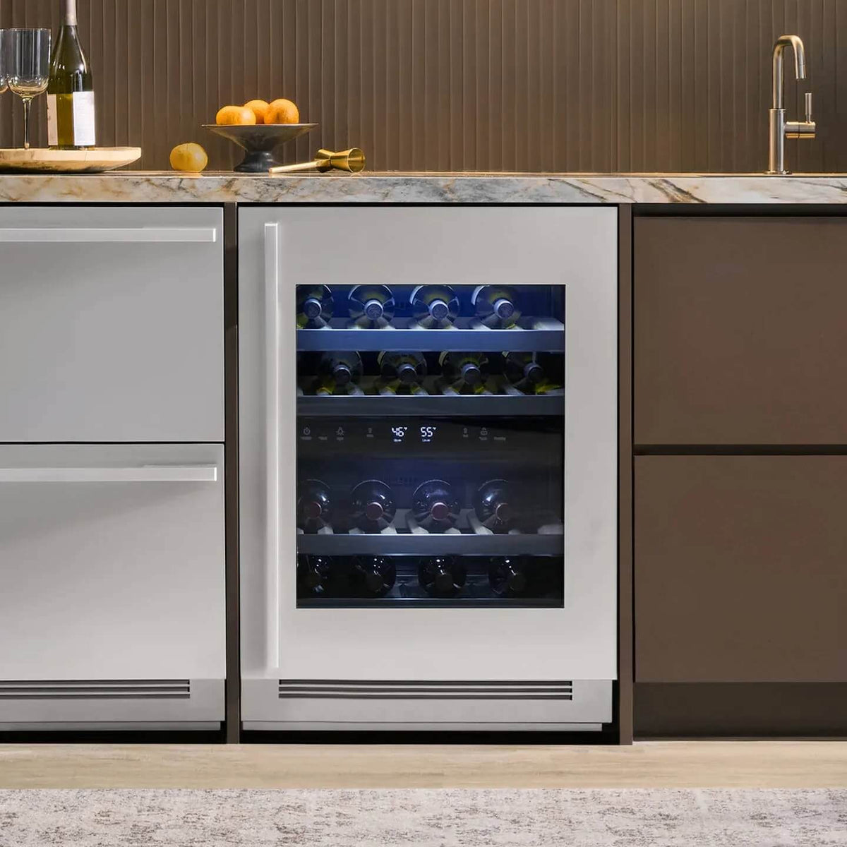 Signature Kitchen Suite undercounter wine cooler fitted under a marble worktop in a home bar