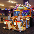 Two children riding Sky Riders at a bowling alley in the evening