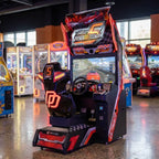 Speed Driver 5 arcade machine glowing in a family entertainment centre