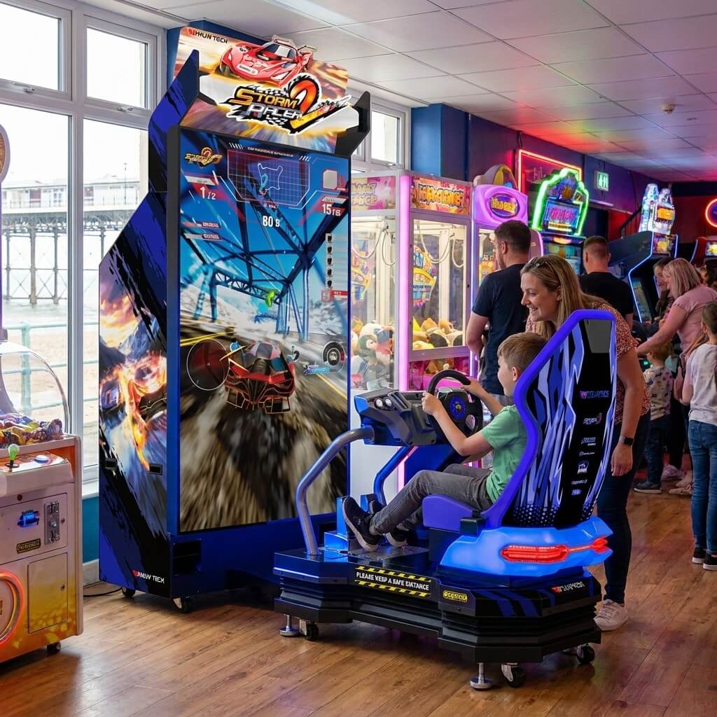 Storm Racer 2 motion racing arcade machine in a UK seaside arcade with a child racing