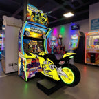 Super Bikes 3 arcade machine glowing in a family entertainment centre