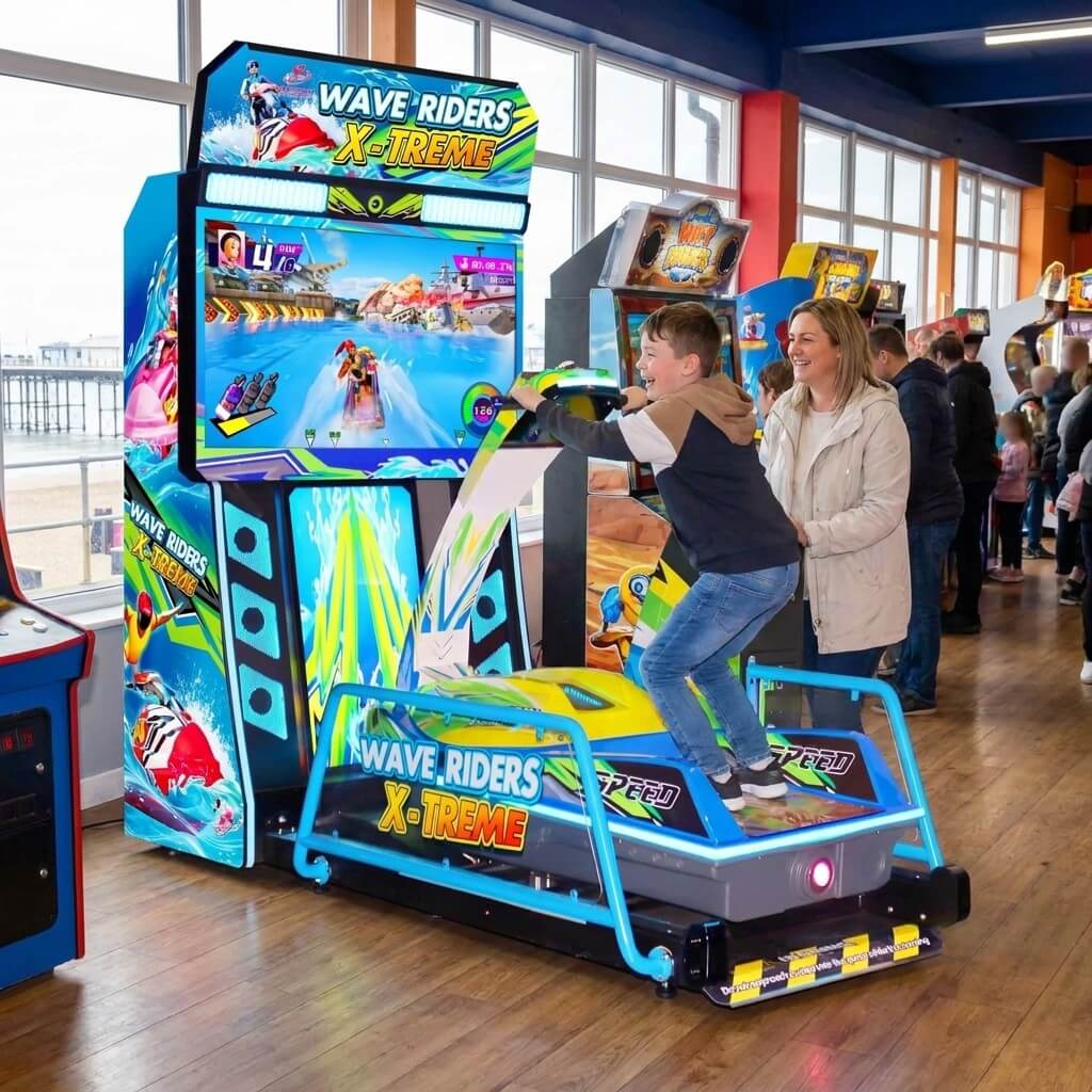 Wave Rider X-Treme speedboat arcade machine in a UK seaside arcade with a child riding
