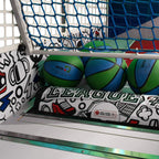 Basketballs in the ball return of the WIK Compact basketball arcade machine