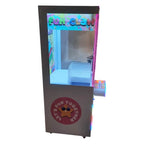 Side view of the WIK Fun Claw arcade claw machine showing the glass prize cabinet and star artwork