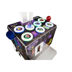 Lit target holes and hammer on the WIK Ghost whack-a-mole arcade game