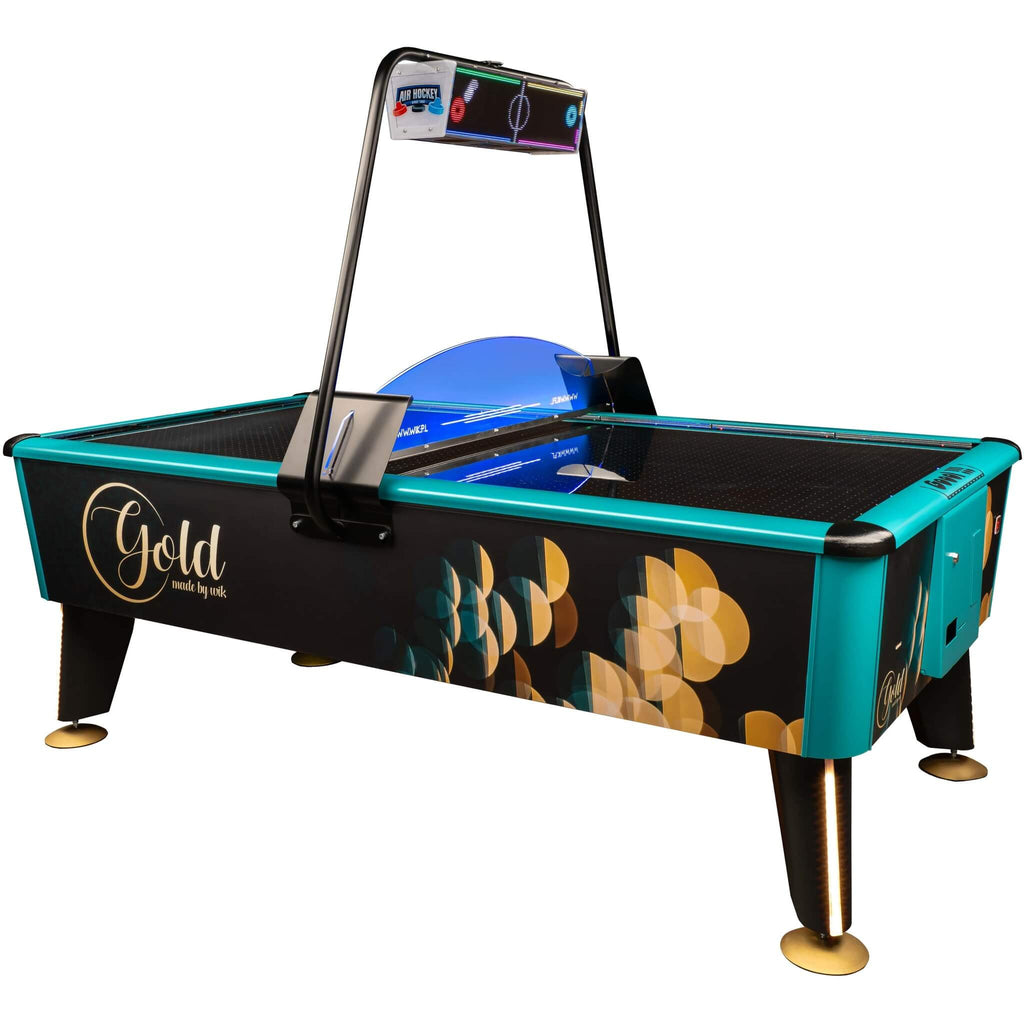 WIK Golden commercial air hockey table with turquoise rails, gold artwork and overhead score display