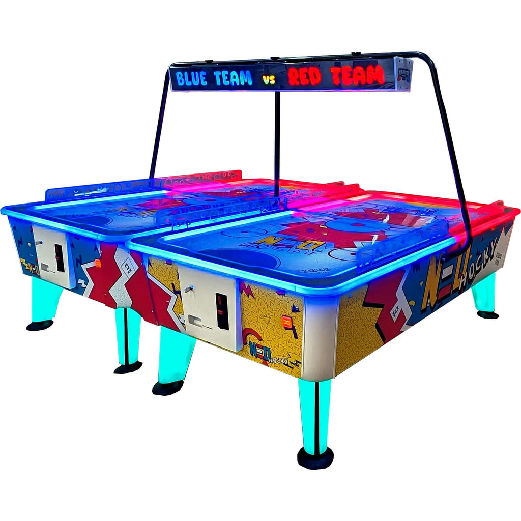 WIK Neo Twin air hockey with two linked tables for four players and a Blue Team vs Red Team score header