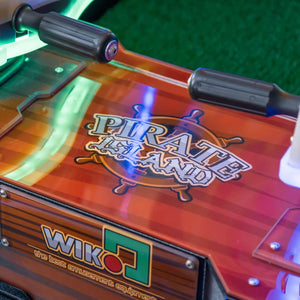 Wooden-effect control deck and handles on the WIK Pirate Island arcade machine