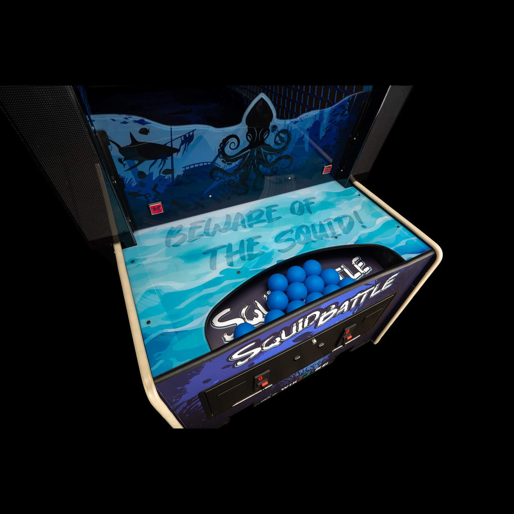 Blue balls in the tray of the WIK Squid Battle arcade machine
