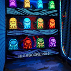 Lit squid and shark targets inside the WIK Squid Battle arcade machine