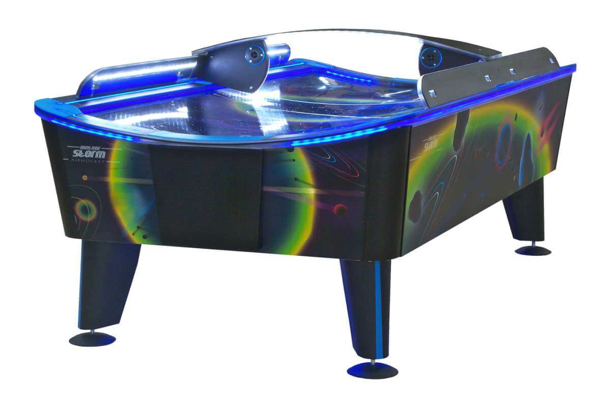 WIK Storm 8ft outdoor waterproof air hockey table with LED playing field, sited on a covered terrace