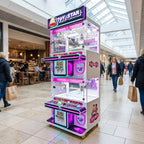 WIK Toy Star Mini 4 player claw machine in a shopping centre walkway next to a cafe