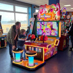 Wild Things 2 player laser shooting arcade machine in a UK seaside arcade with a child playing